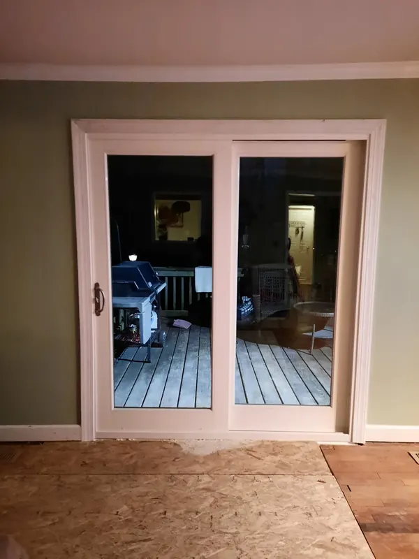 White sliding patio door viewed from inside.