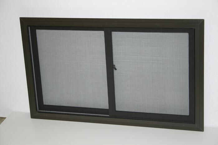 A dark-framed horizontal sliding screen sample with gray mesh